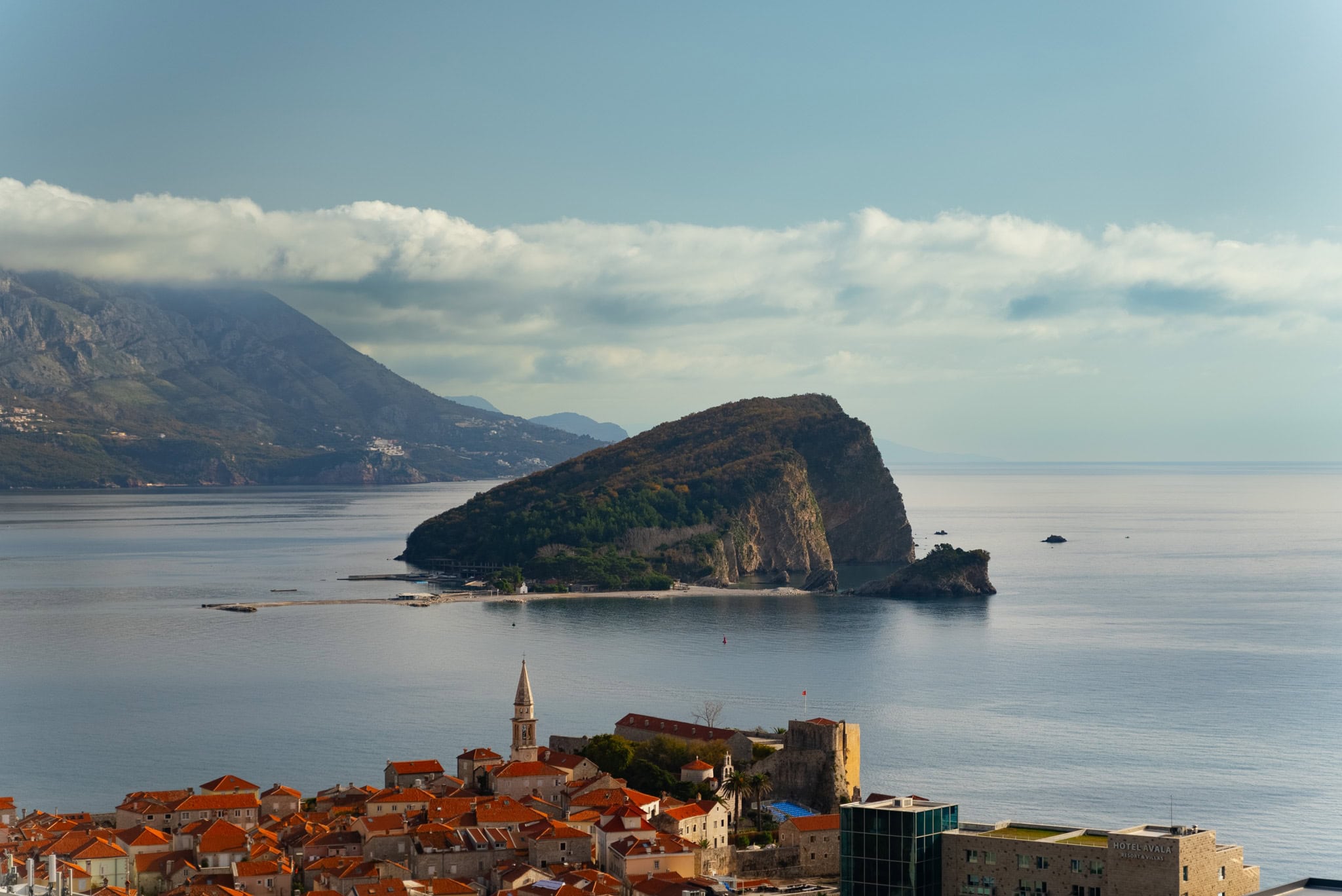 Panoramic view of Budva Old Town, St. Nicholas Island, and the Adriatic Sea, Montenegro.