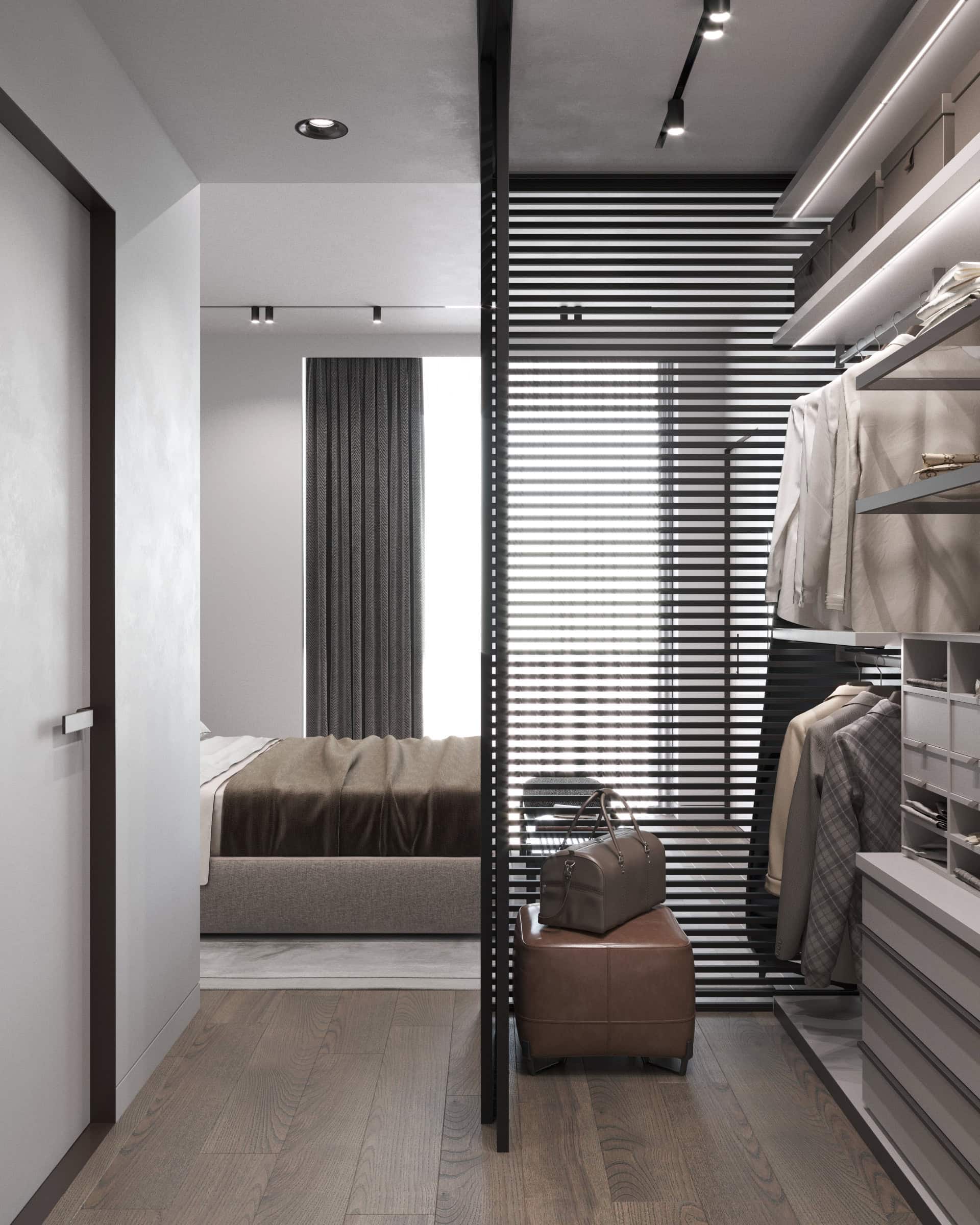 Modern bedroom with a walk-in closet and slatted partition in a residential complex in Tivat, Montenegro: stylish interior, view of the bed.