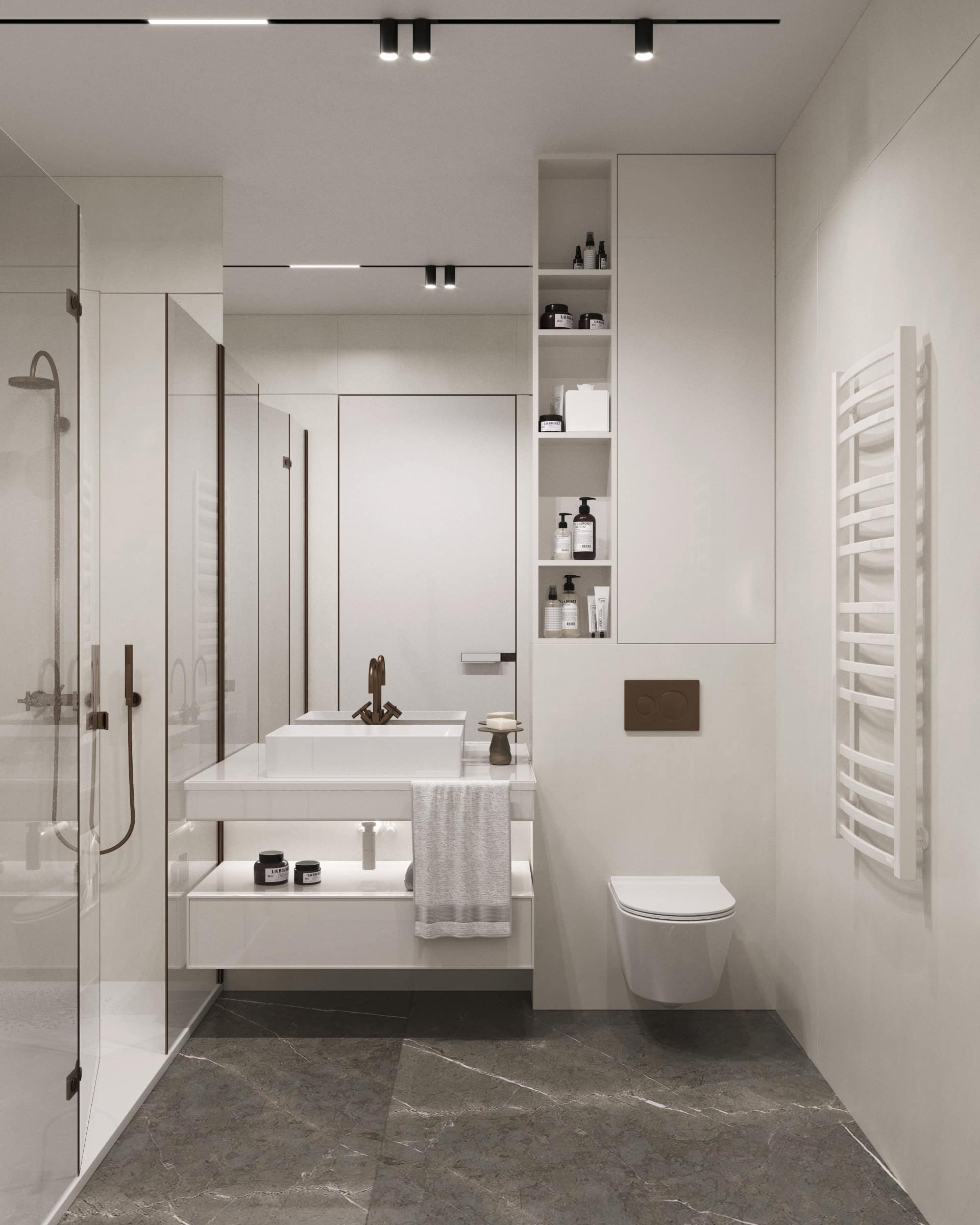 Modern bathroom in the Tivat residential complex, Montenegro: shower cabin, wall-mounted fixtures, and a stylish white interior.