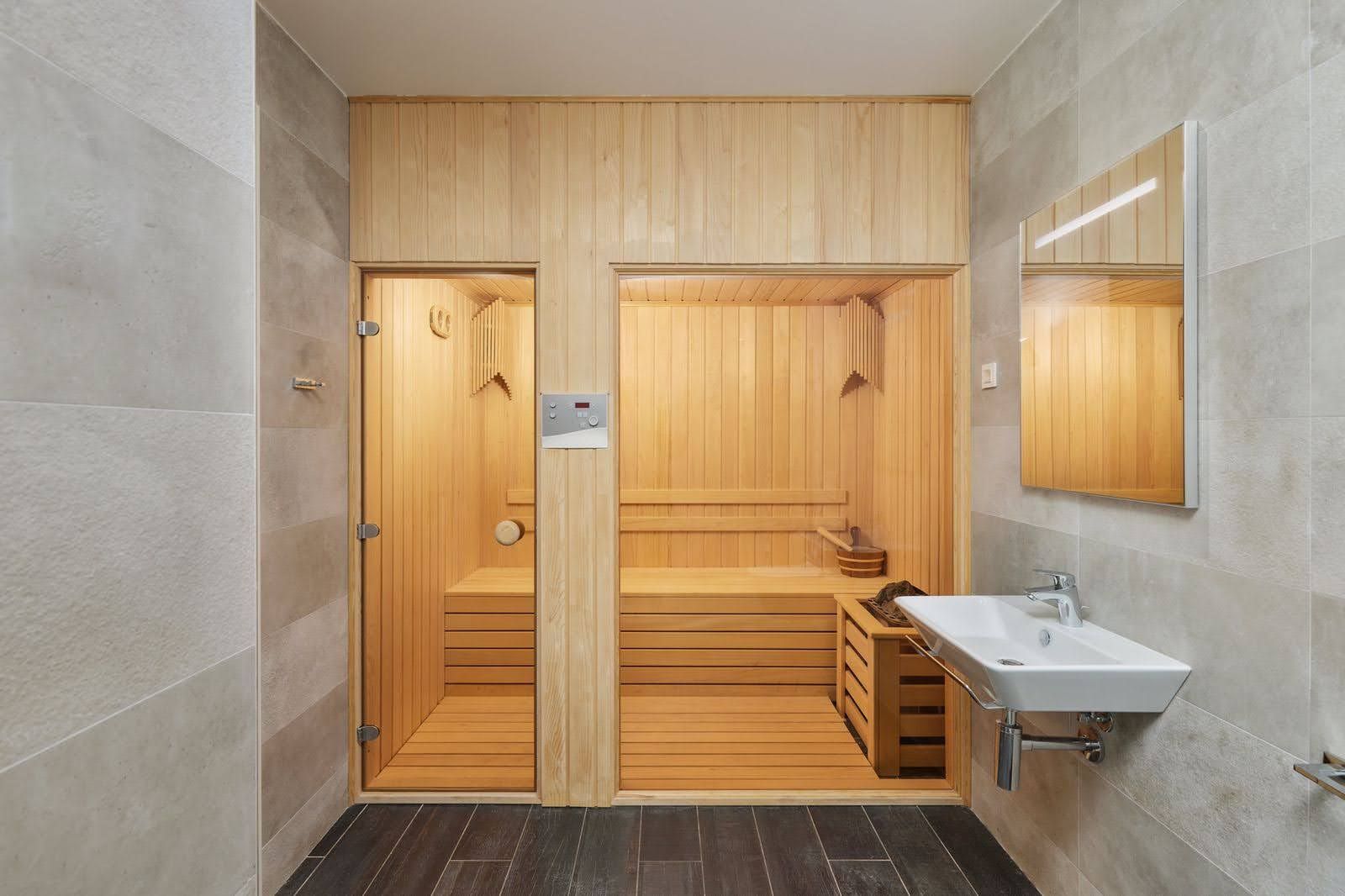 Modern bathroom with sauna and wood finishes in a villa in Prčanj, Montenegro.