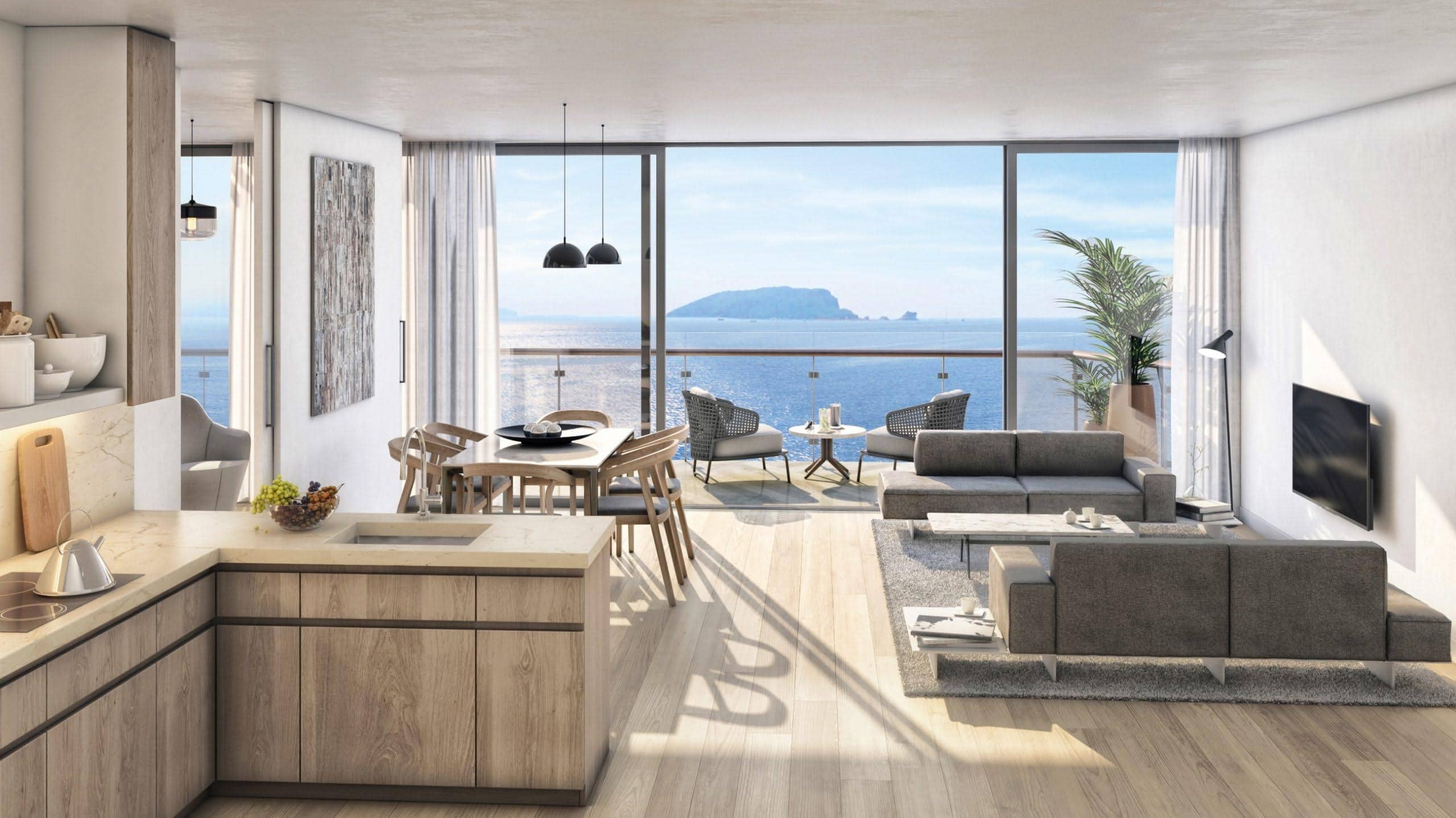 Modern living room with kitchen and panoramic sea view in Budva residential complex, Montenegro: stylish furniture and terrace.