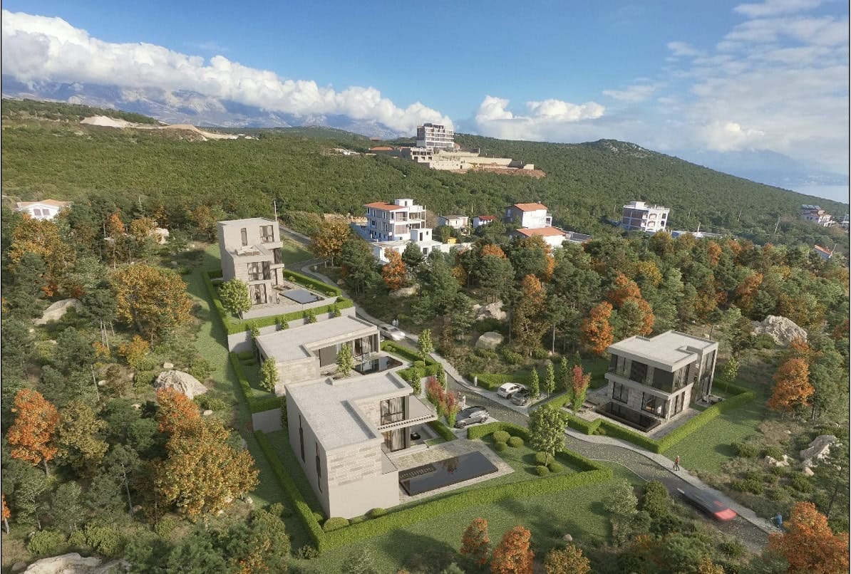 Top view of modern villas with pools in Krimovica, Montenegro: an upscale residential complex surrounded by nature.