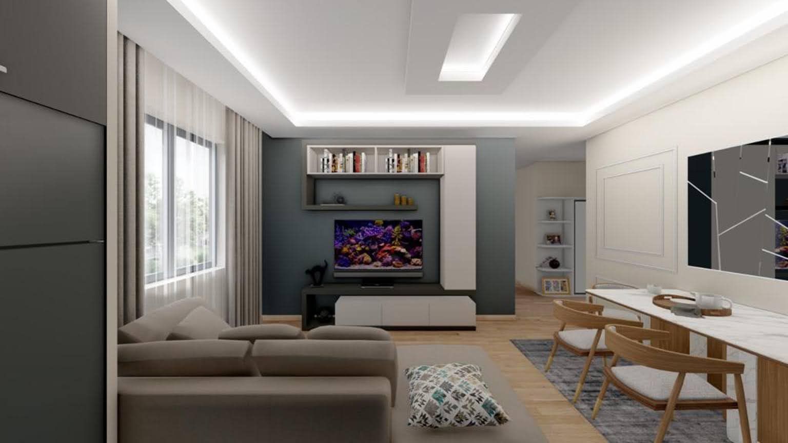 Modern living room with a soft sofa and dining area in the Dobra Vode residential complex, Montenegro: stylish interior and decor.