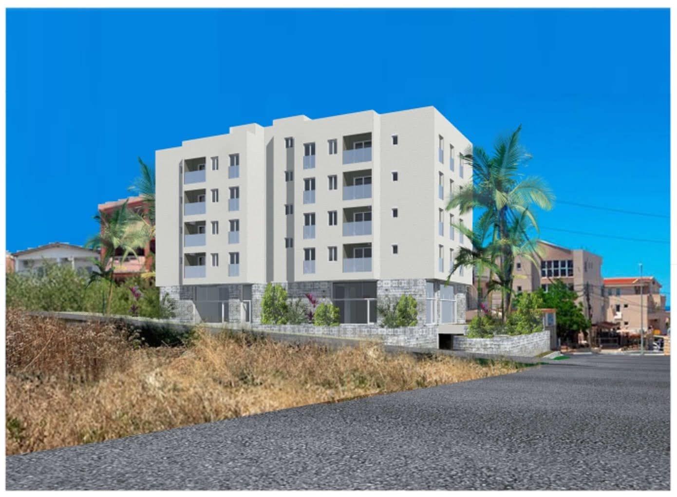 Visualization of a modern residential complex with balconies in Dobra Voda, Montenegro: facade with stone cladding and palm trees.