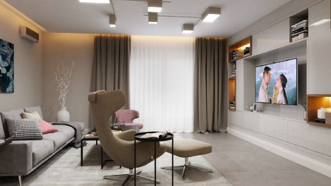 Modern living room in an apartment in Becici, Montenegro: stylish furniture, TV area, and high-quality interior finishes.