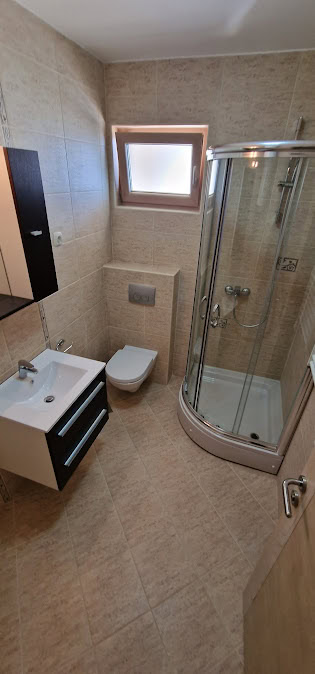 Modern bathroom with a shower cabin in an apartment, Bečići, Budva Riviera, Montenegro.