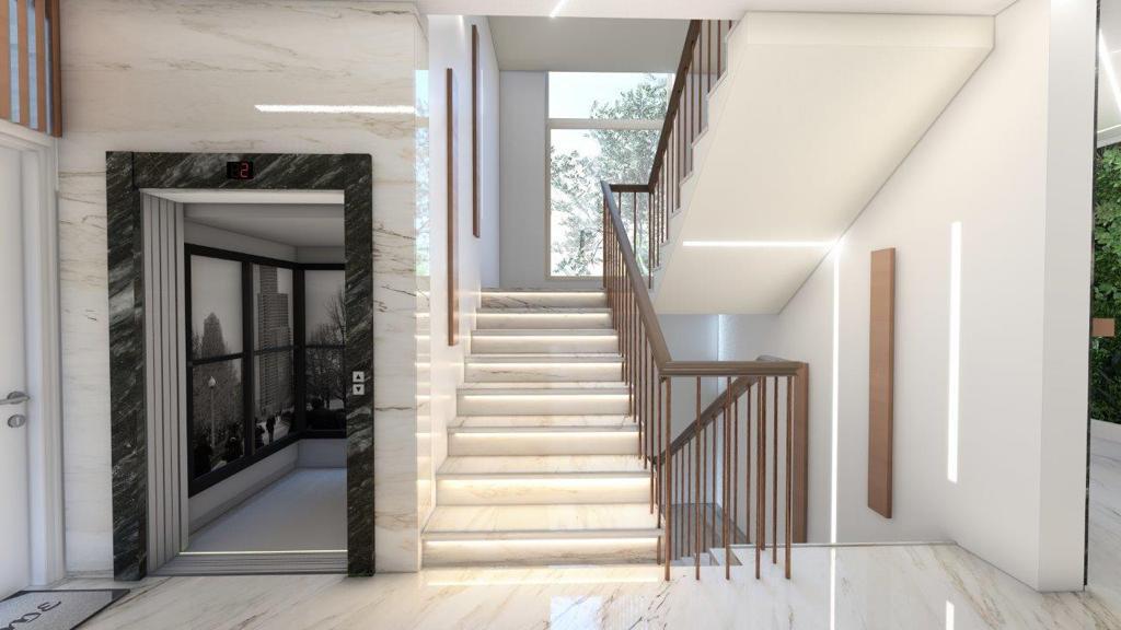 Modern apartment building lobby interior in Dobrota, Montenegro: marble staircase with lighting, elevator, and stylish finishes.