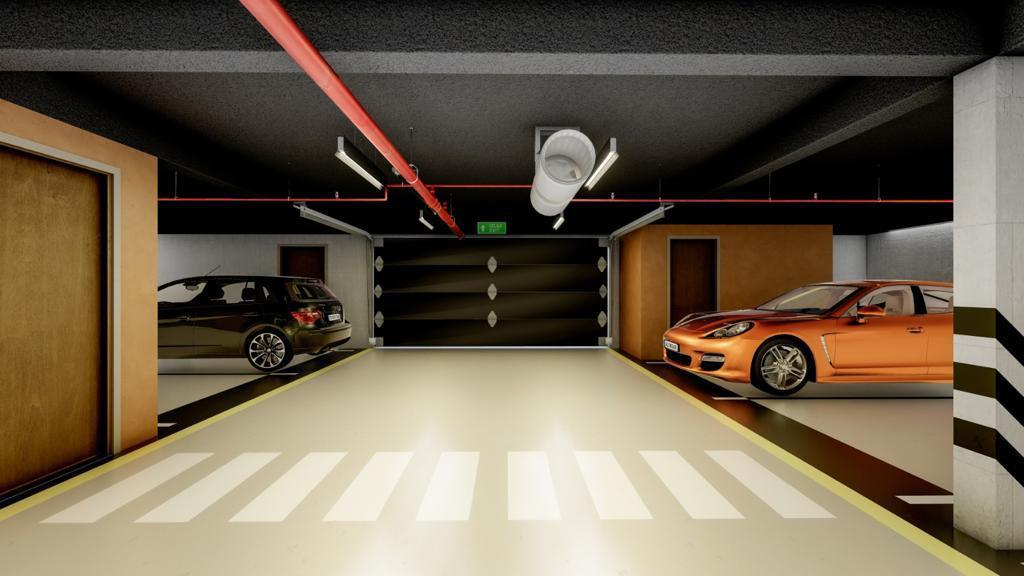 Underground parking in a residential complex in Dobrota, Montenegro: modern parking spaces with markings and lighting.