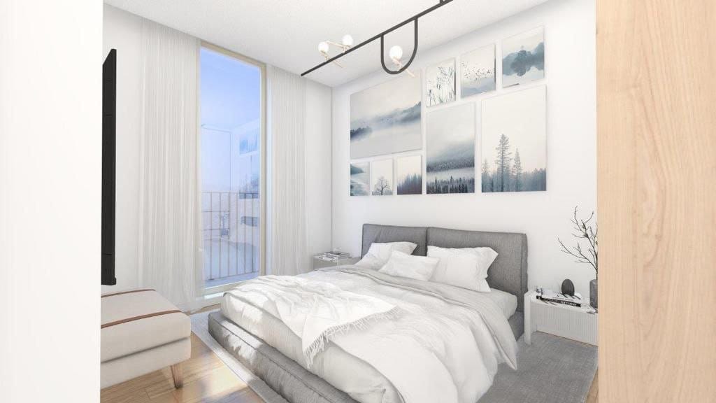 Modern bedroom in a residential complex in Dobrota, Montenegro: double bed, panoramic window, and stylish decor in light tones