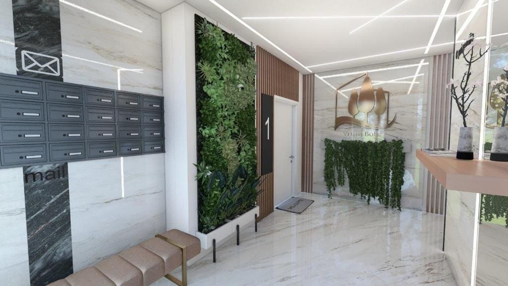Modern residential complex lobby in Dobrota, Montenegro: marble finishes, vertical greenery, and mailboxes.
