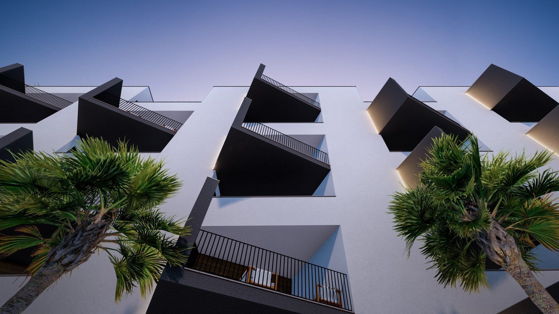 Modern residential complex in Bečići, Montenegro: low-angle view of the facade with designer balconies and palm trees.