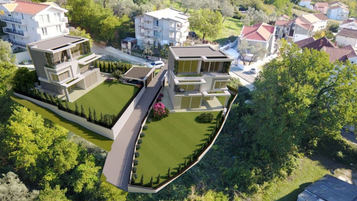 Aerial view of modern villas with private gardens and parking in Tivat, Montenegro: luxury real estate project.