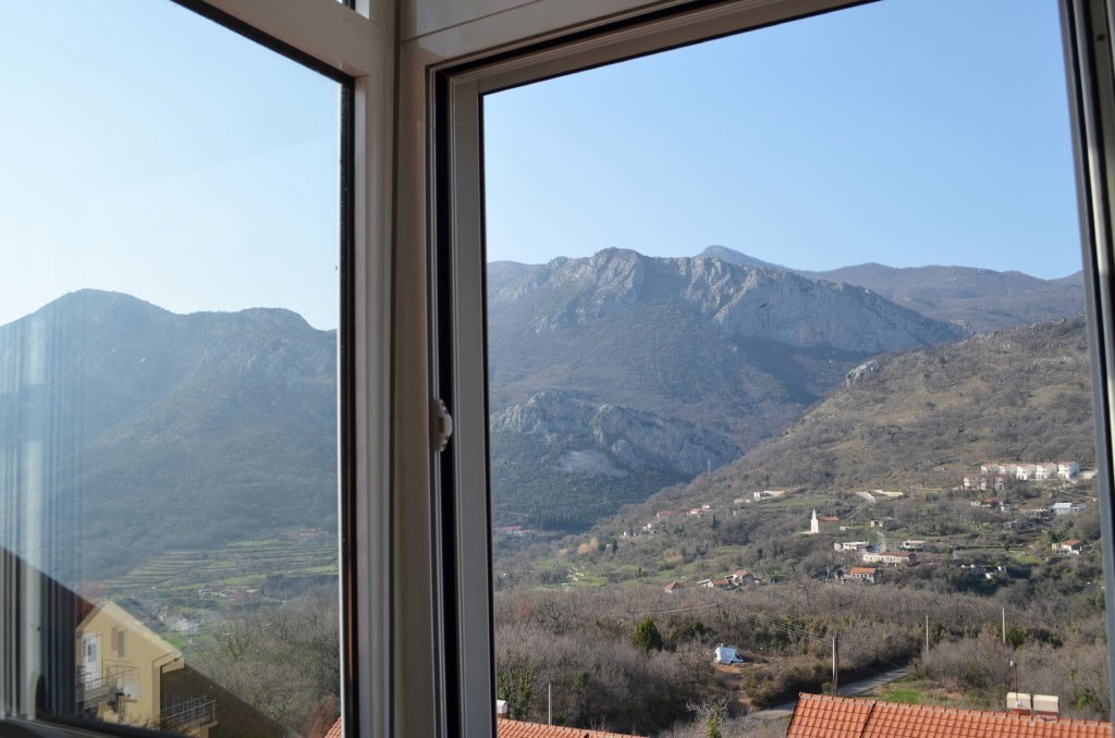 View from the window of the mountains and valley in an apartment in Bar, Montenegro: panoramic view from the apartment balcony.