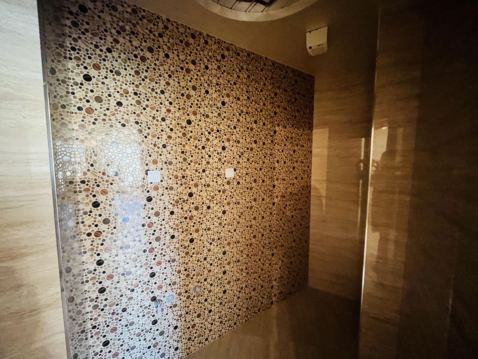 Designer bathroom finish with a mosaic wall in an apartment, Budva, Montenegro.