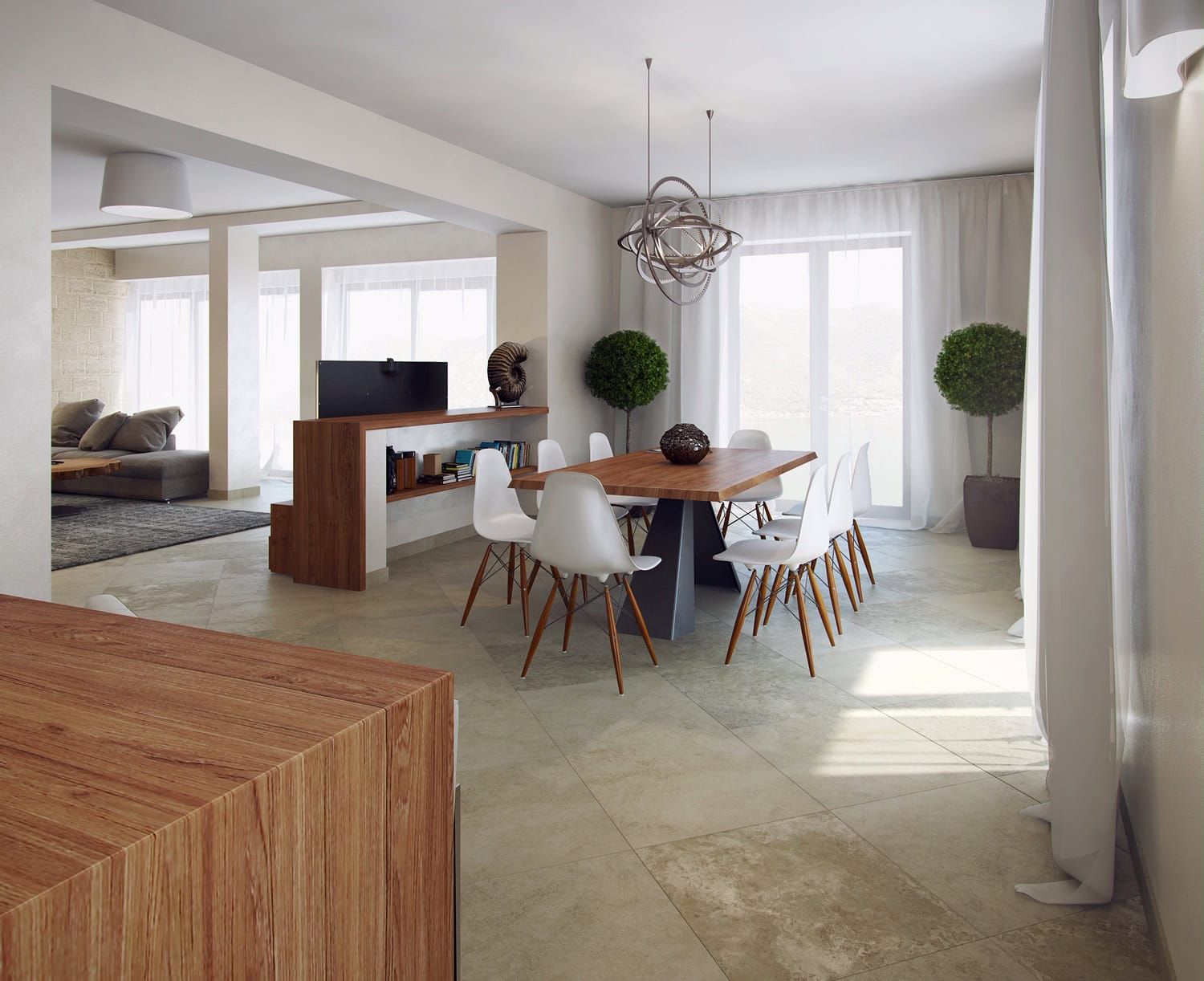 Modern living room with dining area in a villa in Dobrota, Montenegro: wooden table, white chairs, and sea view.
