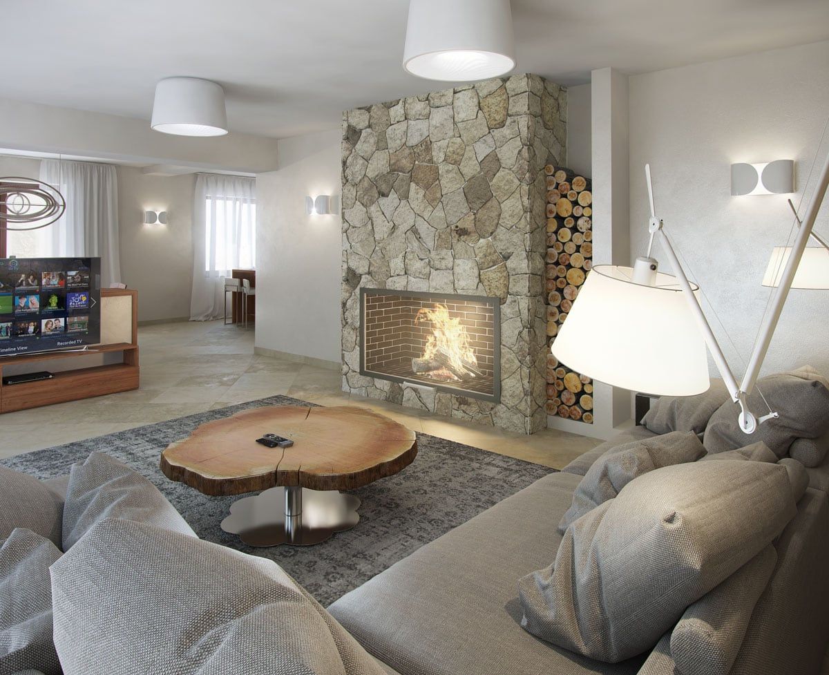 Villa living room in Dobrota, Montenegro: stone fireplace, live-edge wood table, soft sofa, and modern interior.