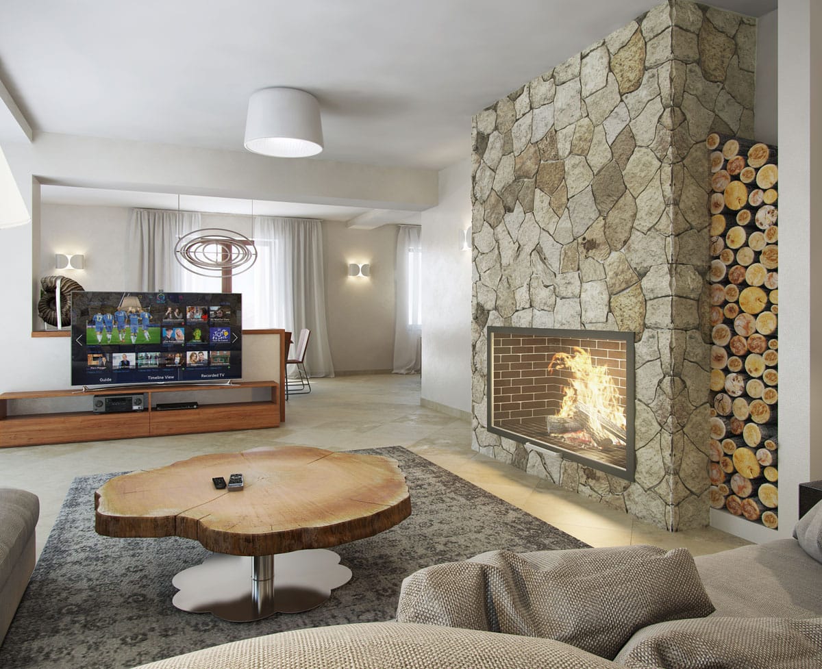 Villa living room in Dobrota, Montenegro: stone-clad fireplace, a wood-slab coffee table, and a TV area.