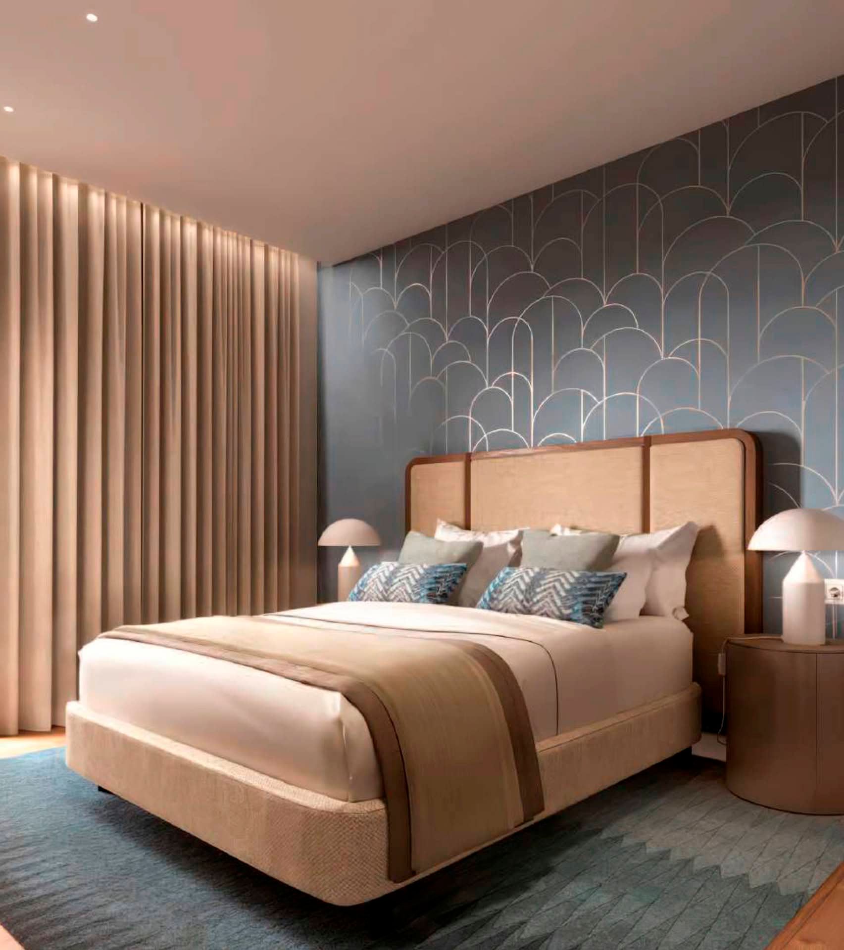 Modern bedroom at Boka Place hotel, Tivat, Montenegro: double bed, designer wallpaper, and soft lighting.