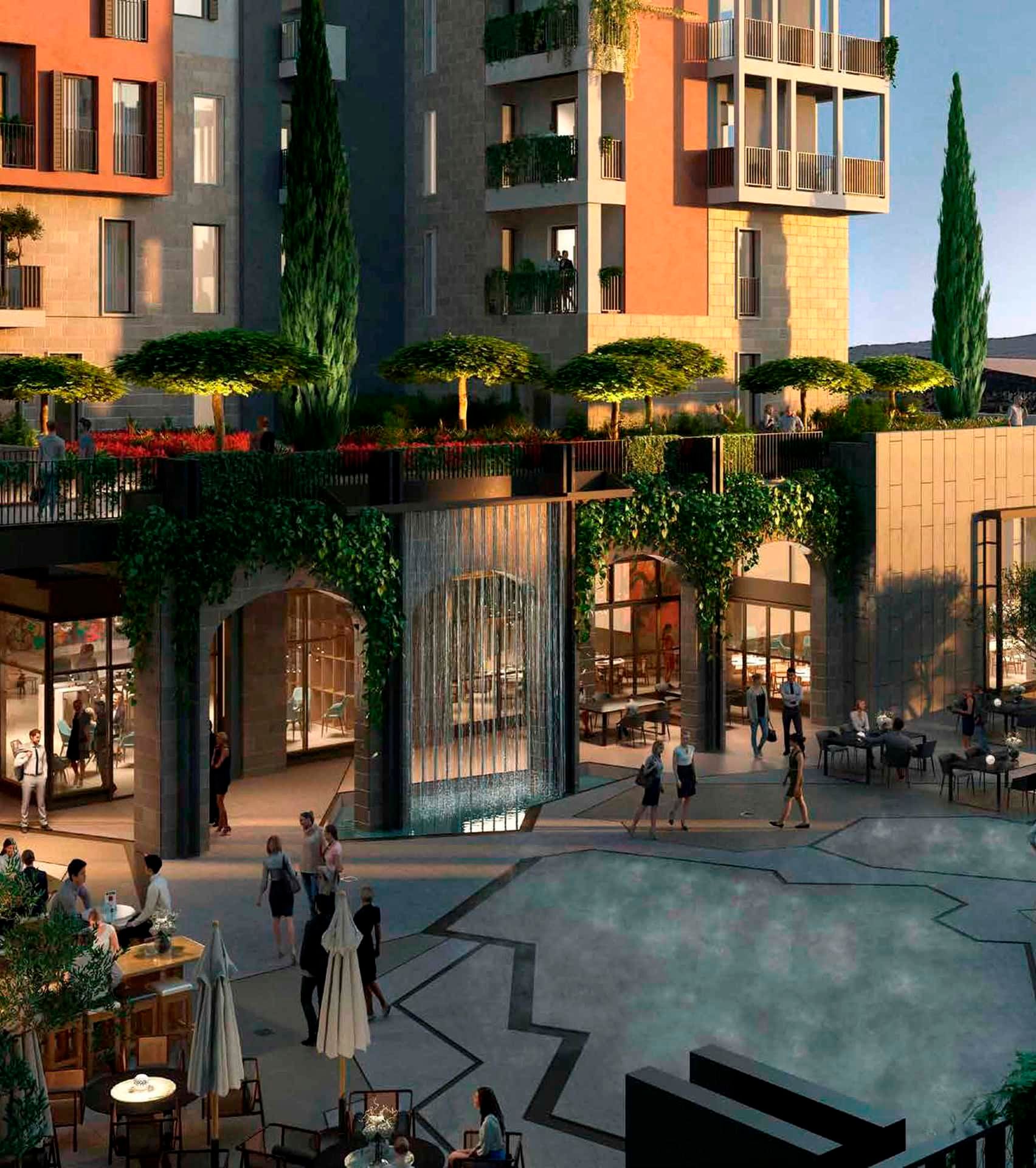 Modern residential complex Boka Place in Tivat, Montenegro: a landscaped square with a waterfall and relaxation areas.