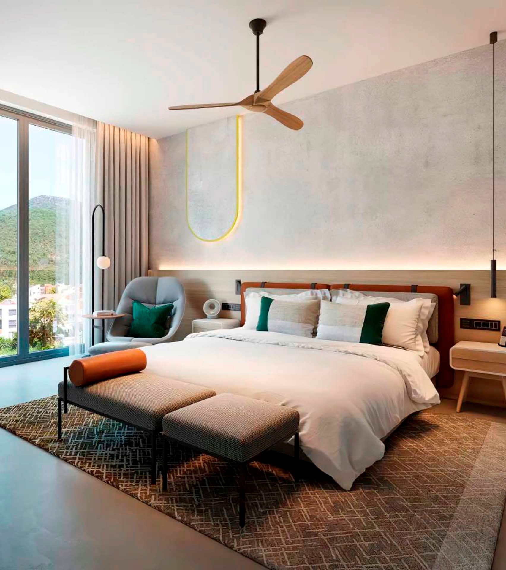 Modern bedroom at Boka Place Hotel, Tivat, Montenegro: double bed, panoramic windows, and mountain views.