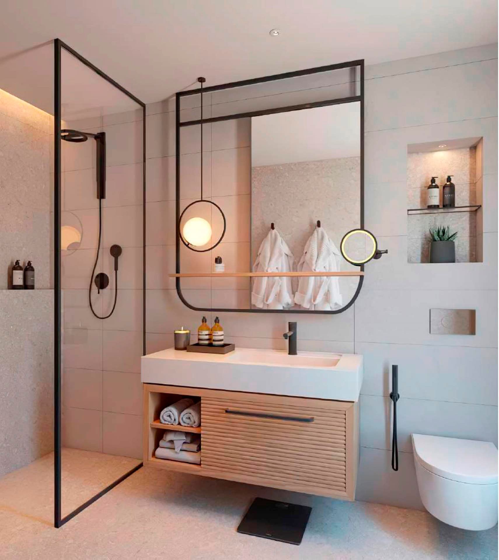 Modern bathroom in Boka Place hotel, Tivat, Montenegro: shower cabin, stylish vanity and mirror.