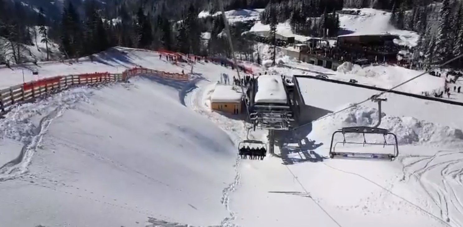 View of the ski lift and snow-covered slopes from K1600 Hotel in Kolašin, Montenegro, in winter.