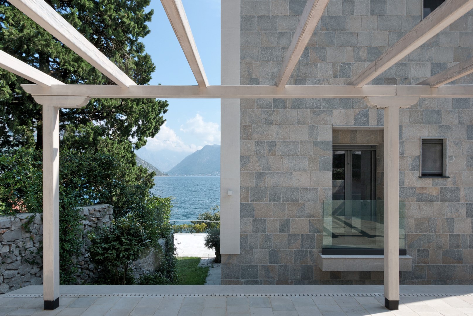 Stone villa in Strp, Montenegro: view from the pergola terrace of the sea and the mountains of Kotor Bay.