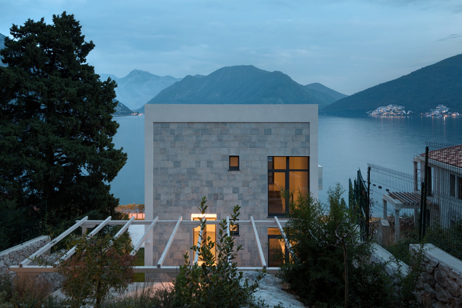 Modern stone villa with a terrace and views of the Bay of Kotor, Strp, Montenegro.