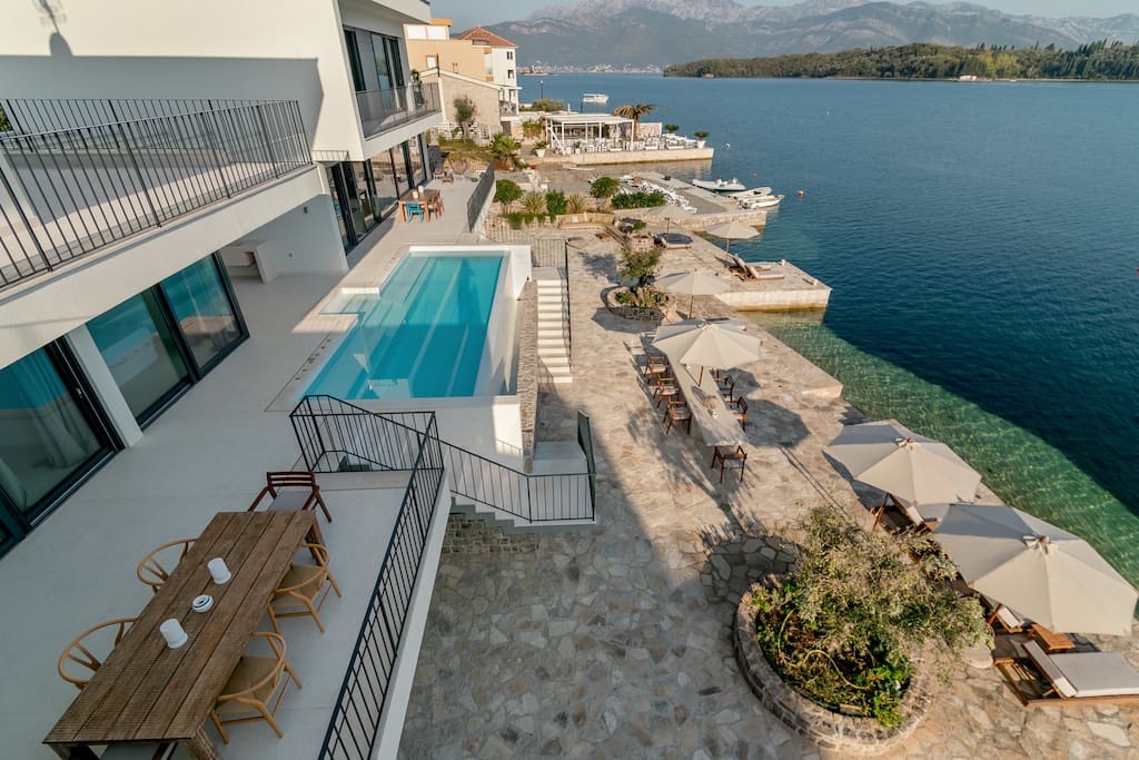 Villa on the first line in Luštica, Montenegro: pool, terrace with dining area, and direct access to the sea.