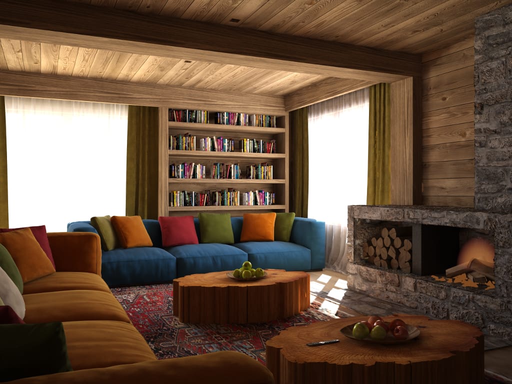 Hotel living room in Kolašin, Montenegro: stone fireplace, wood finishes, soft sofas, and bookshelves.