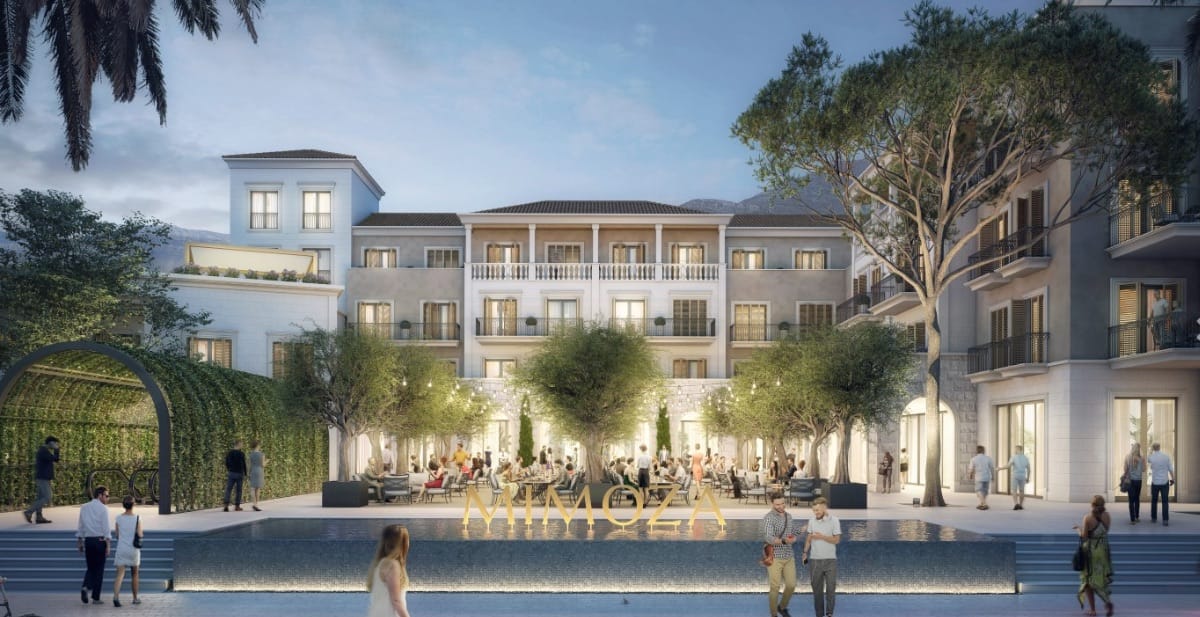 Facade of the Mimoza Hotel in Tivat, Montenegro: modern architecture, an inner courtyard with a pool and lounge areas.