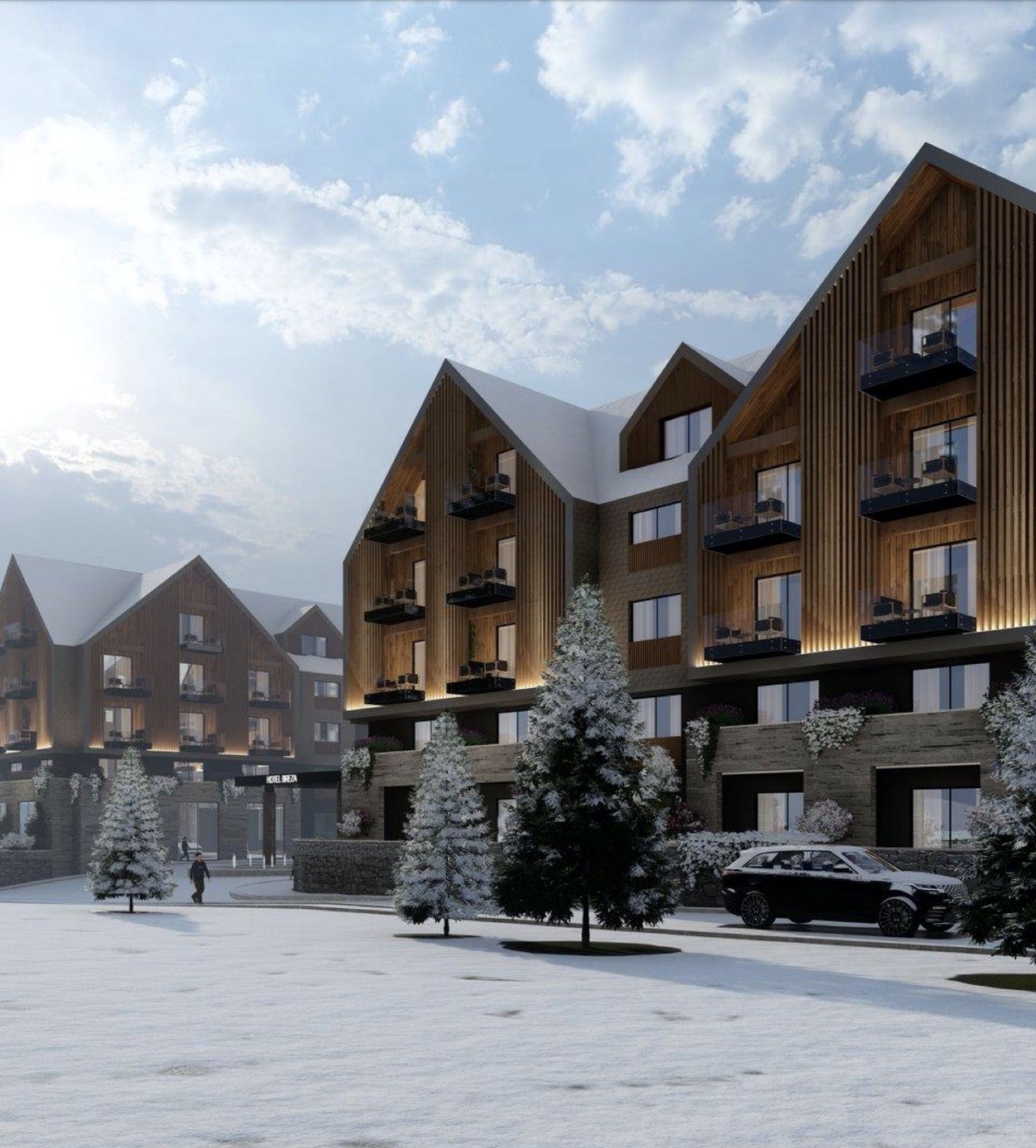 Modern Breza hotel in Kolašin, Montenegro: chalet-style architecture, wooden finishes, and a snow-covered grounds.