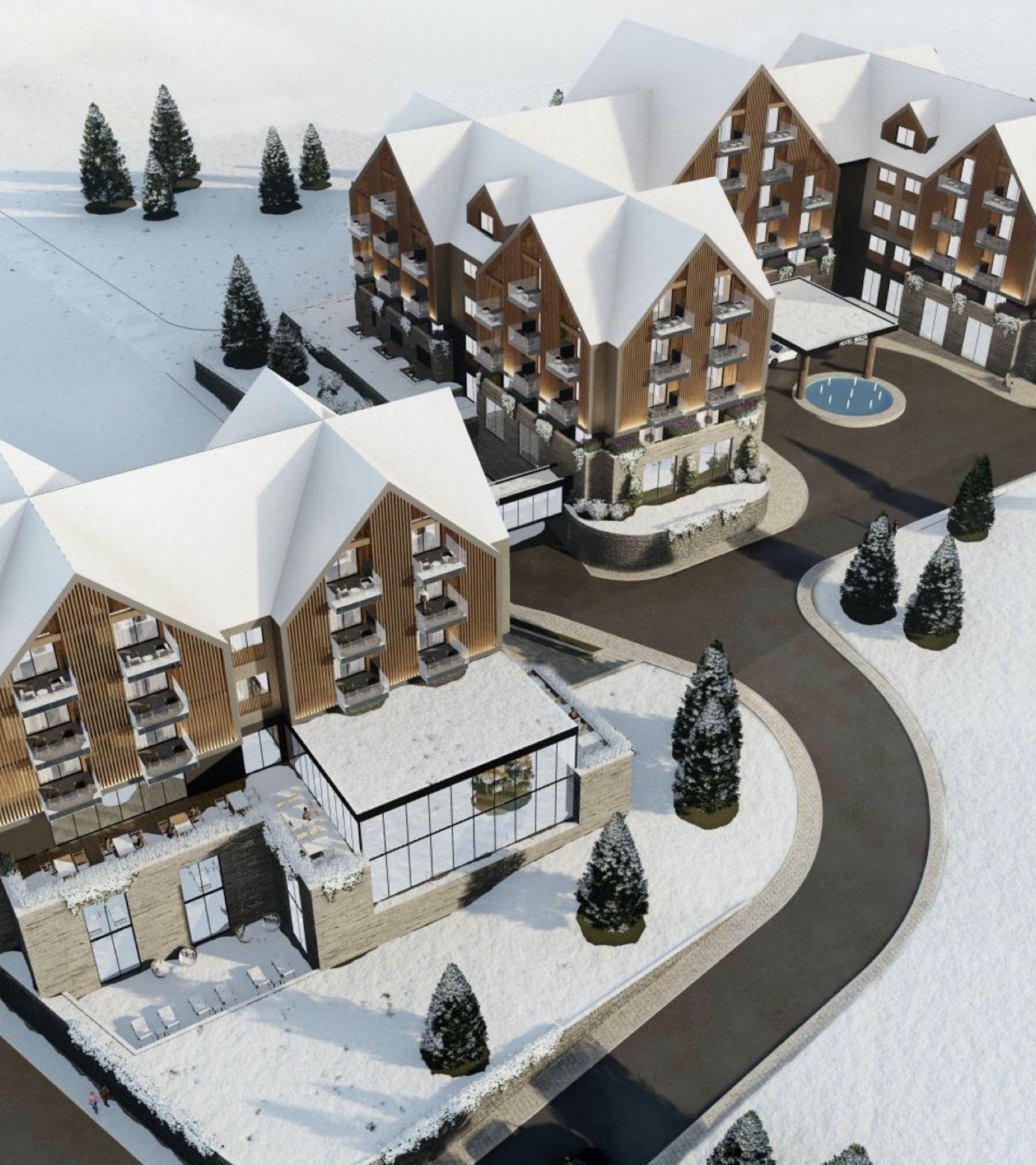 Top view of the modern Breza hotel in Kolašin, Montenegro: a mountain complex with panoramic windows in the snow.