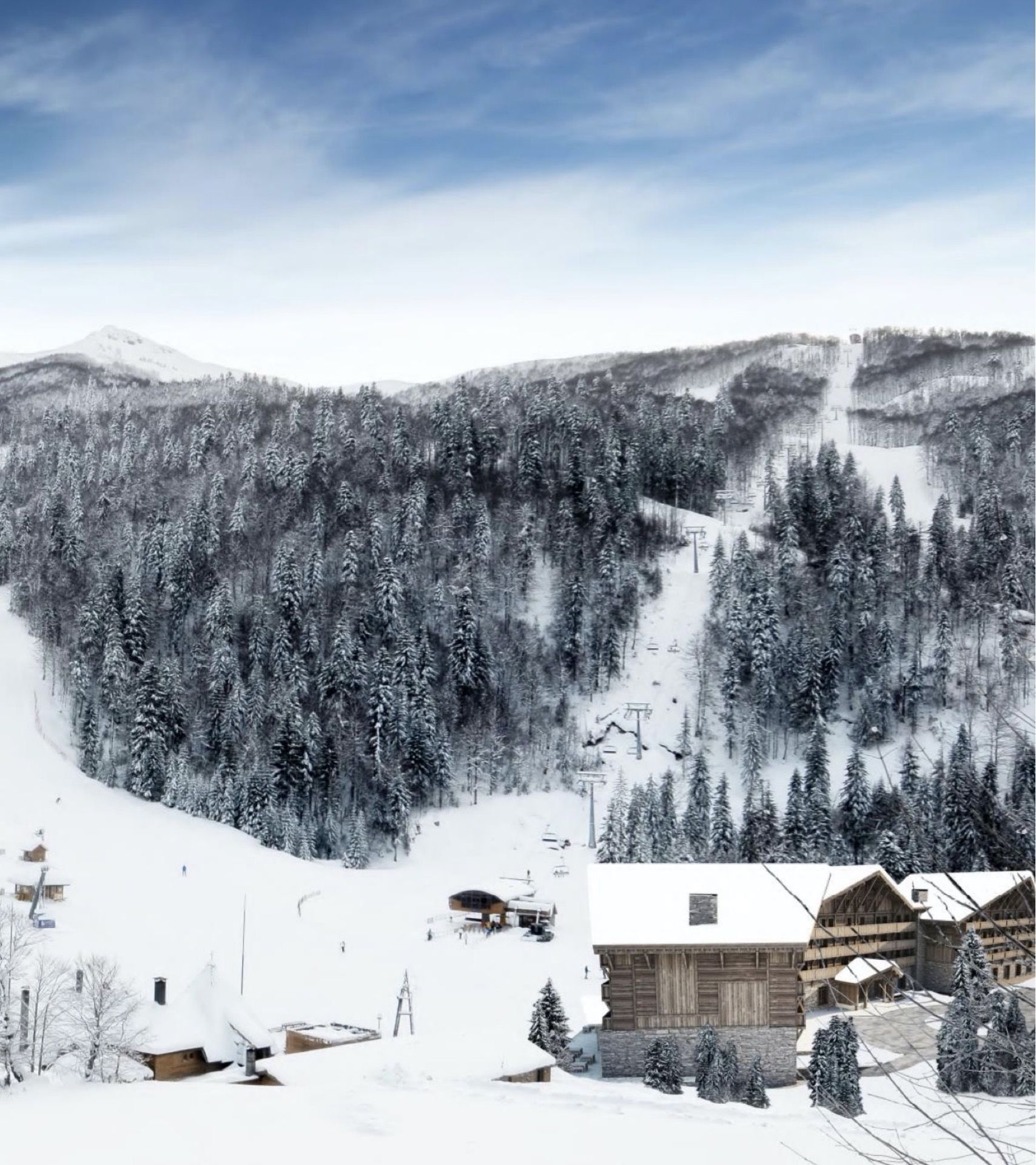 View of the Breza Hotel in Kolašin, Montenegro: a snowy ski resort with lifts and forest in winter.