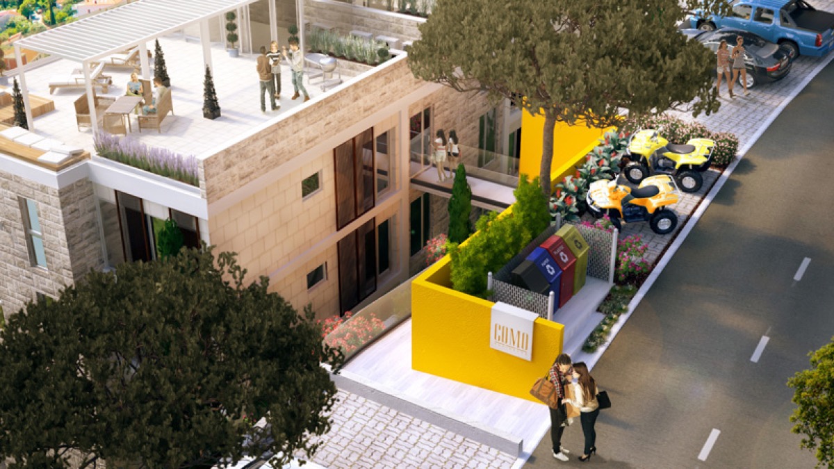 Modern residential complex Como in Budva, Montenegro: terrace with furniture, stone facade finish, and parking.