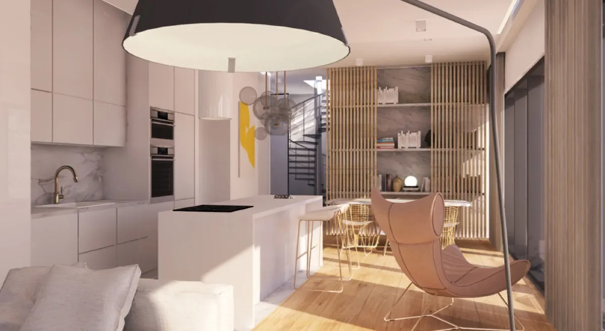 Modern kitchen with white cabinets, a central island, built-in ovens, and an open-plan living area.