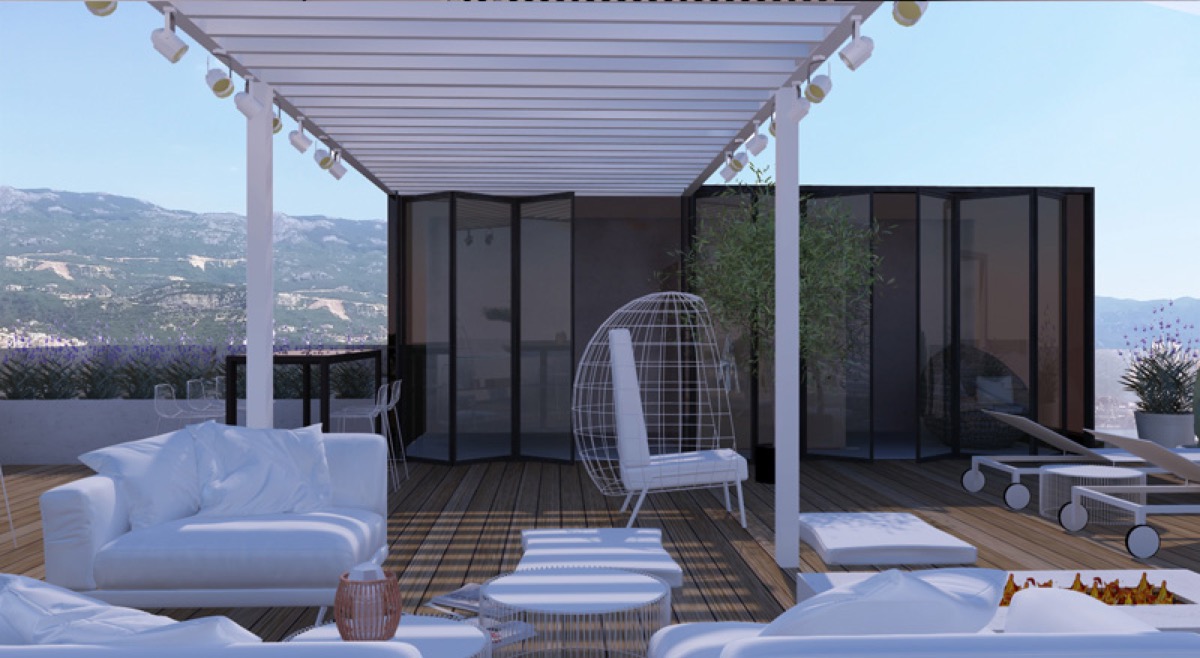 Penthouse terrace with furniture and mountain views in a residential complex, Budva, Montenegro: lounge area with a pergola and sun loungers.