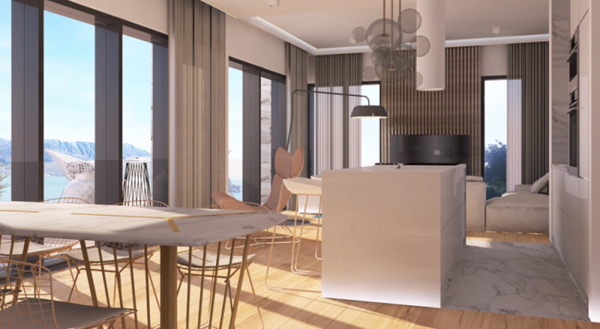 Modern living room with panoramic sea view in Budva residential complex, Montenegro: marble table, designer furniture, and kitchen.