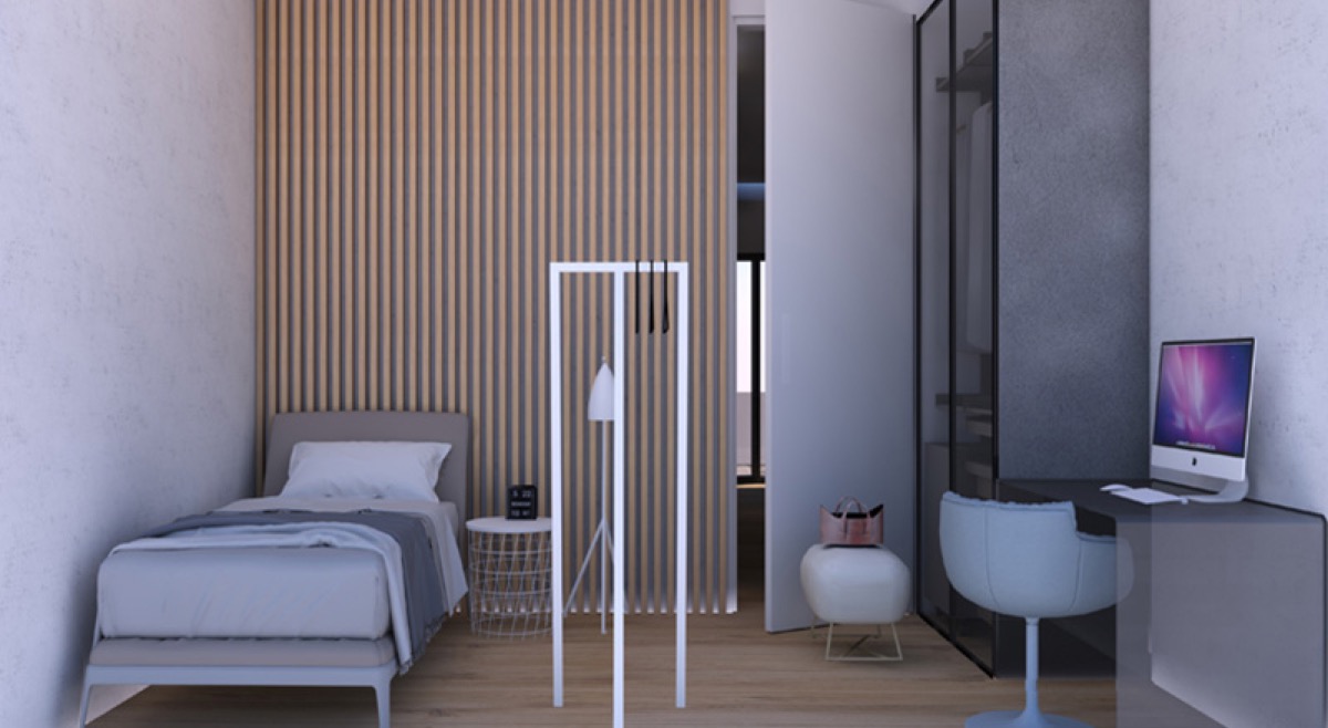 Modern bedroom with a slatted wall, bed, and workspace in a residential complex, Budva, Montenegro.
