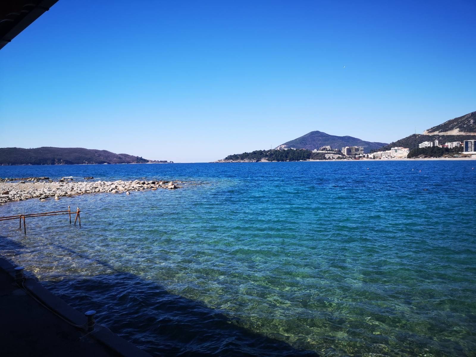 Panoramic view of the Adriatic Sea and the beach from a commercial space in Rafailovići, Montenegro.