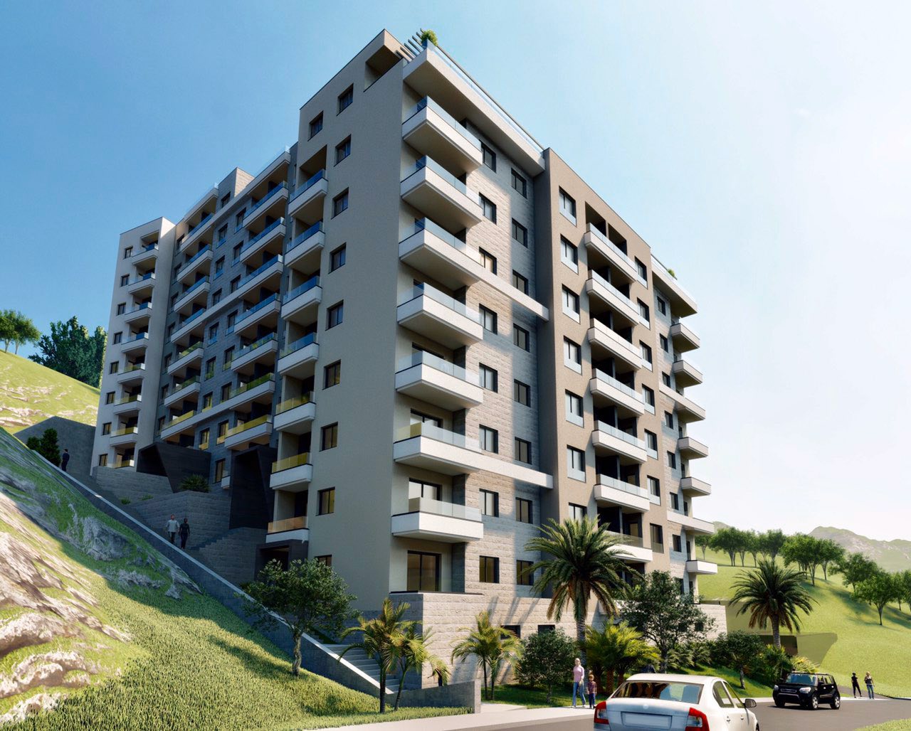 Modern residential complex with balconies in Bečići, Montenegro: view of a multi-story building with landscaping.