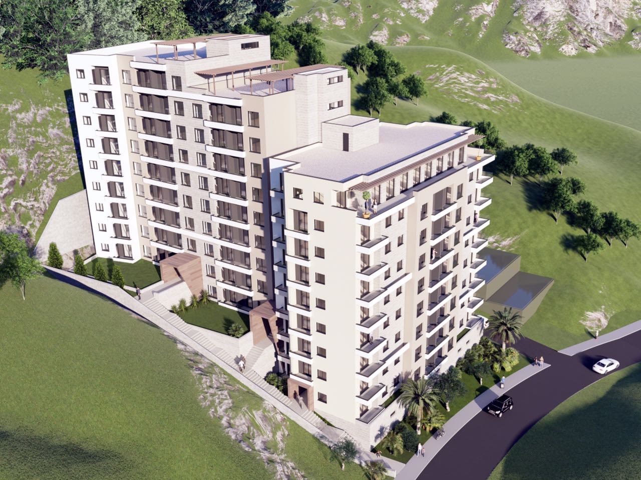 Top view of modern residential complex No. 1657 in Bečići, Montenegro: a multi-story building with terraces and parking.