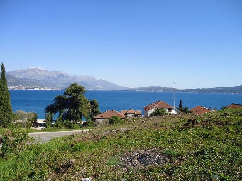 Land plot in Bijela, Montenegro, with panoramic sea and mountain views, located near the coast.