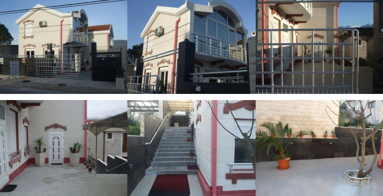 Two-story house in Tivat, Montenegro: modern facade, panoramic windows, terrace, and landscaped grounds.