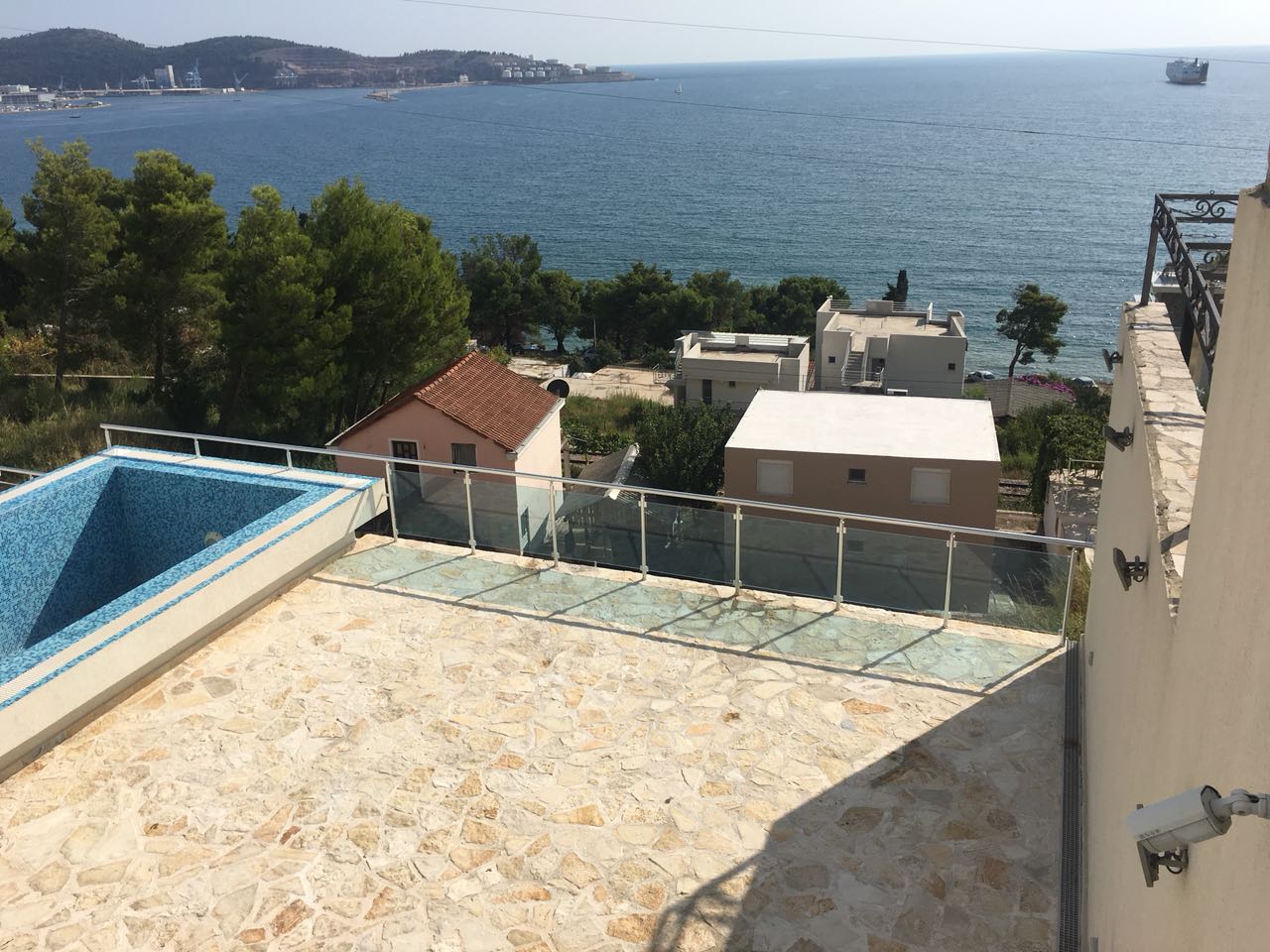 Terrace with a pool and panoramic sea view in a house in Shushan, Bar Riviera, Montenegro.