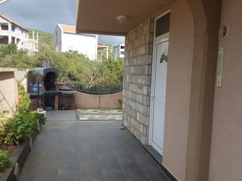 Terrace with stone finishes and a barbecue area in a house, Krymovitsa village, Montenegro.