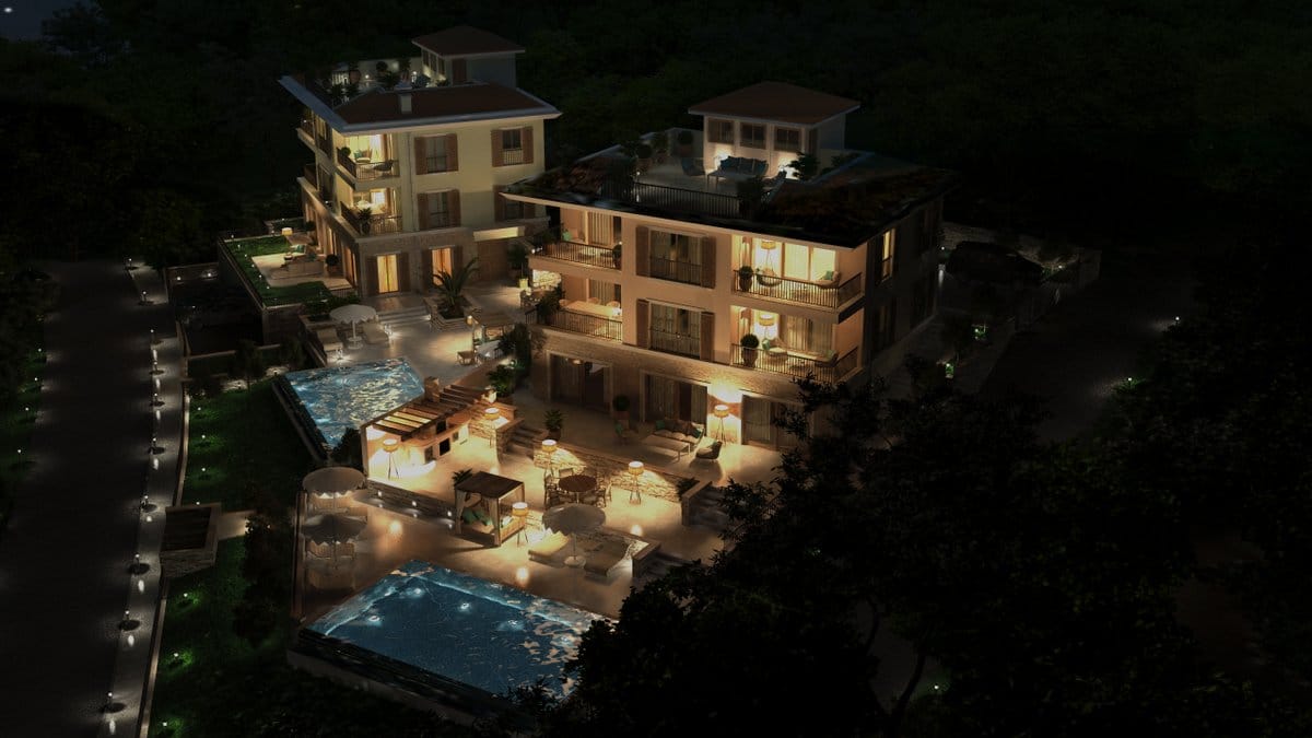 Night villa in Rezevici, Montenegro: an upscale complex with pools, lounge areas, terraces, and landscape lighting.