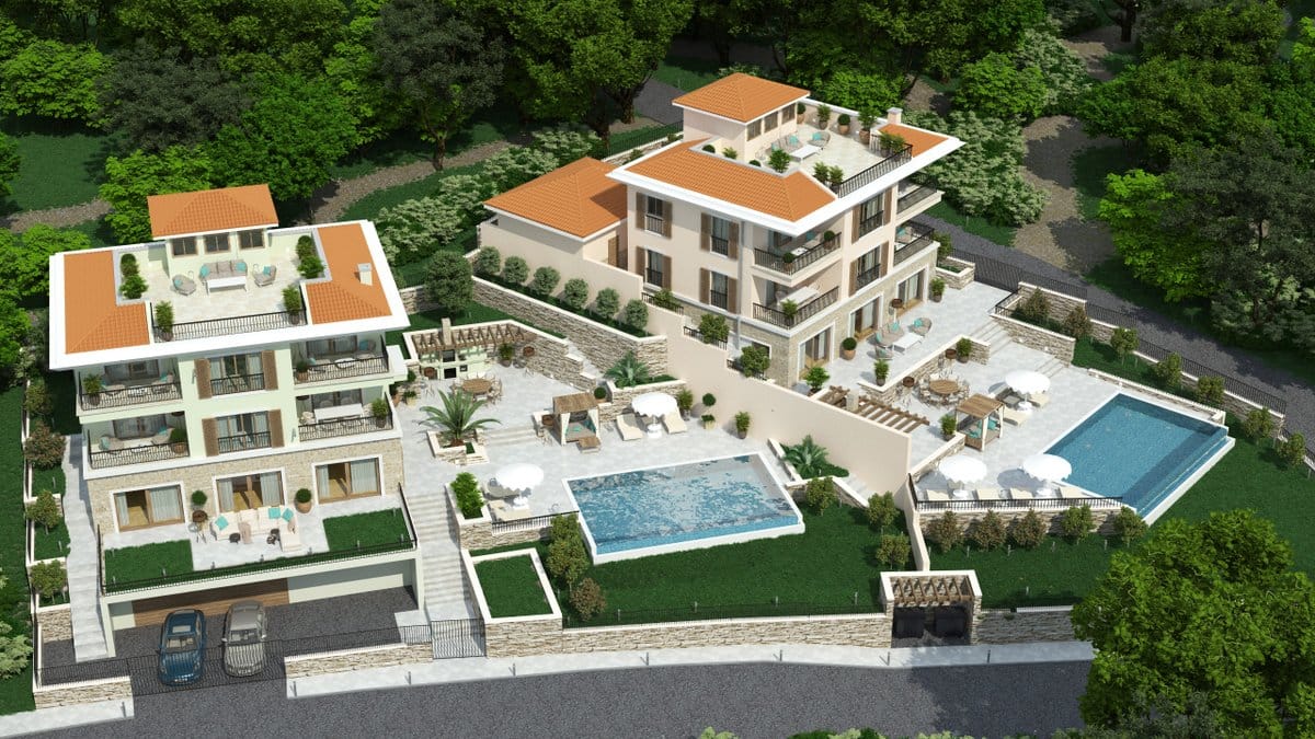Two modern villas with pools, terraces, and parking in Reževići, Montenegro: aerial view of luxury real estate.