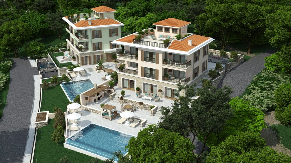 Luxury villas in Rezevici, Montenegro: aerial view of homes with pools, terraces, and a barbecue area surrounded by greenery.