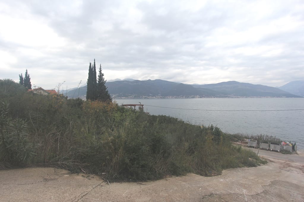 Land plot in Krašići, Montenegro: panoramic sea and mountain view, first line, natural landscape.